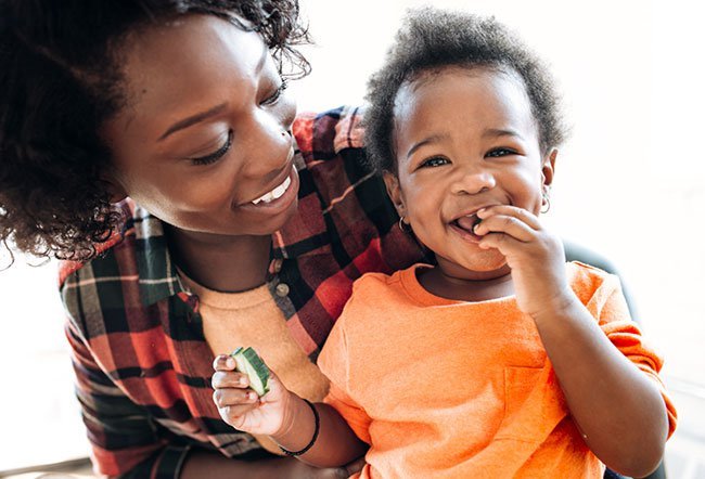 Eating meals with your toddler allows you to lead by example.