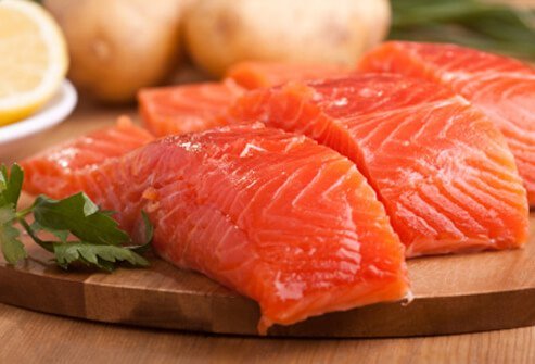 Fatty fish, such as salmon, is a good source of omega-3 fatty acids that are needed for brain growth and function.