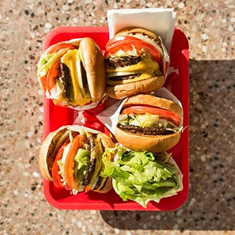 Burgers and fries are low-fiber and high in fat.