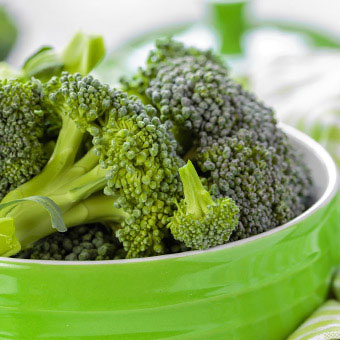 A pot of raw broccoli.