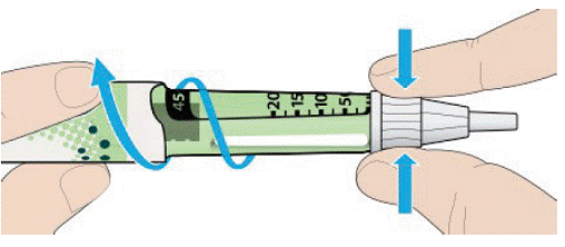 Grip and squeeze the widest part of the outer
needle cap - Illustration