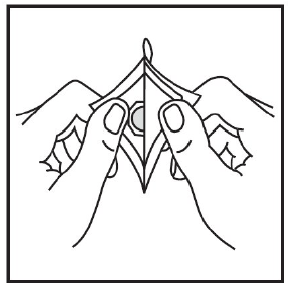 Remove the clear plastic backing from the tan-colored round Transderm Scop - Illustration