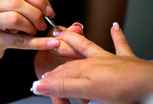 Photo of woman's hand manicure.