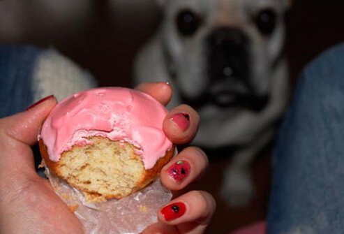 Binge eating a cupcake, may feel guilty, ashamed, or depressed.