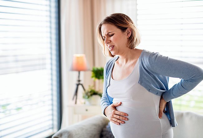 Labor contractions are the tightening of a woman's uterus in order to deliver a baby. Contractions feel like a gradual tightening of the abdominal muscles followed by relaxation.