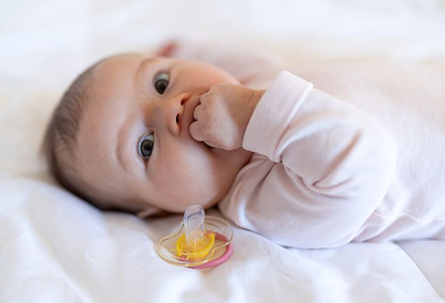 Your three-month-old baby has made tremendous development since birth. Babies who are three months of age have achieved developmental milestones in moving, speaking, interacting, thinking, sensing and sleeping. 