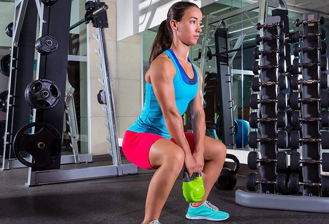 The goblet squat is one of the most effective exercises to build lower body strength. It also works on the upper body and the core. It engages and helps tone the muscles of the core, back, forearms, and to an extent, the shoulders and upper back.