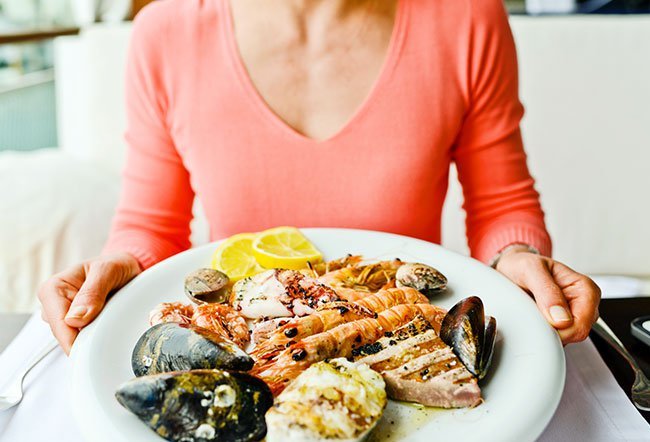 A buildup of uric acid, caused by purines, in the body causes gout. Foods that are high in purines include all alcoholic drinks, shellfish and certain other types of fish, bacon, turkey, veal, liver, and venison.