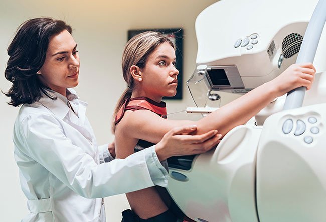 Positron Emission Tomography (PET or PET scan) is a radiographic imaging test to look at breast cells as they function in real-time with an aim to diagnose breast cancer and other abnormalities throughout the body.