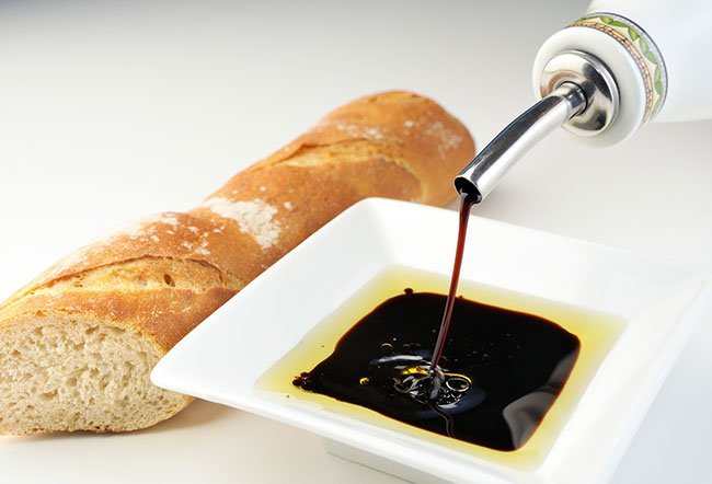 Balsamic vinegar or aceto balsmico is a kind of dark, concentrated, and intensely flavored vinegar Balsamic vinegar or aceto balsmico is a kind of dark, concentrated, and intensely flavored vinegar