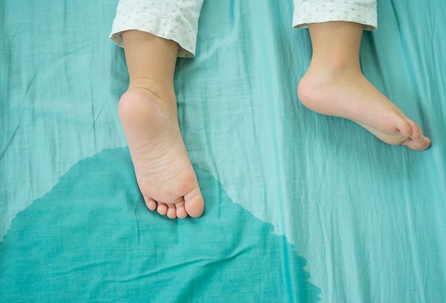 when should you stop bedwetting
