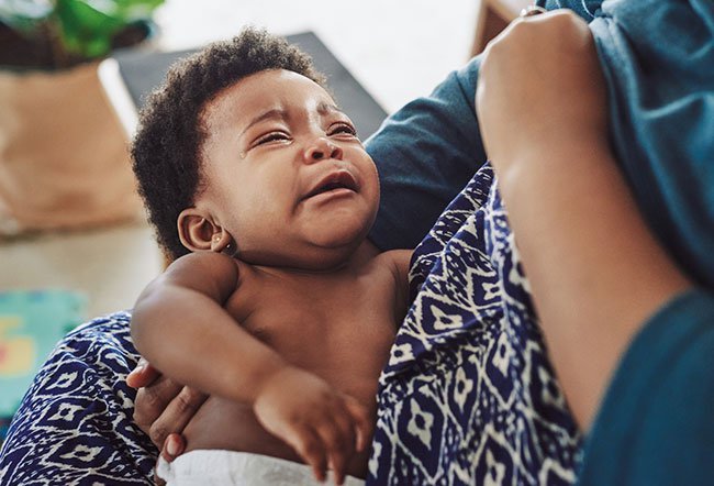 A baby not wanting to eat is typical behavior. If your baby doesn't want to eat, try different feeding positions, wear clothing that allows for easy access to the breasts, maintain your milk supply and offer the breast often. 