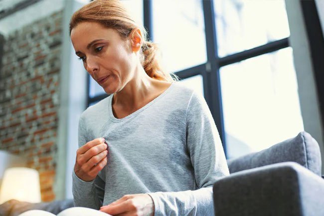 The average age a woman's periods stop for good is 51.