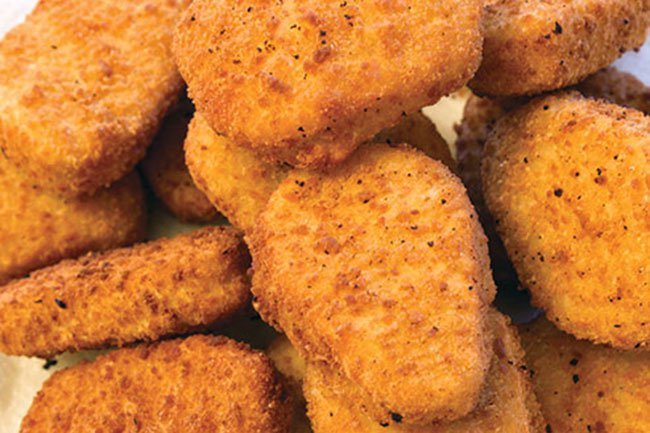 A piece of chicken breast battered and fried to golden perfection? Not exactly.