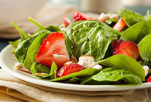 Strawberries are a lower-sugar fruit that make a colorful addition to salads.
