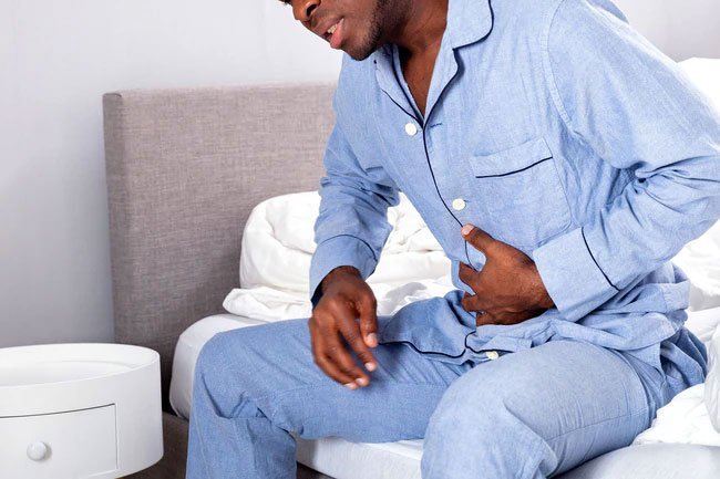 Peptic ulcers may lead to the appearance of dark blood in the stool.