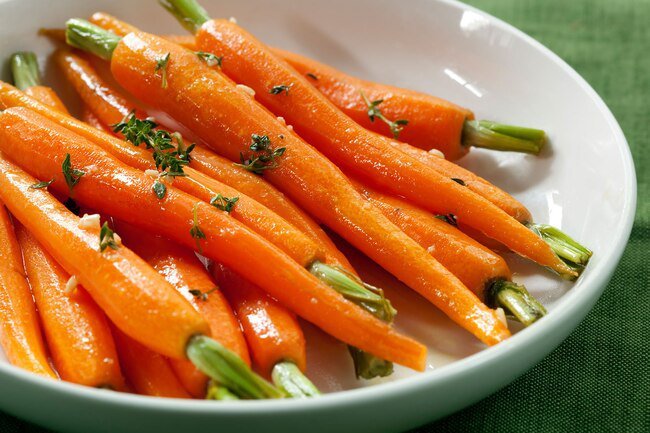 Vitamin C and carotene may make your urine orange colored.