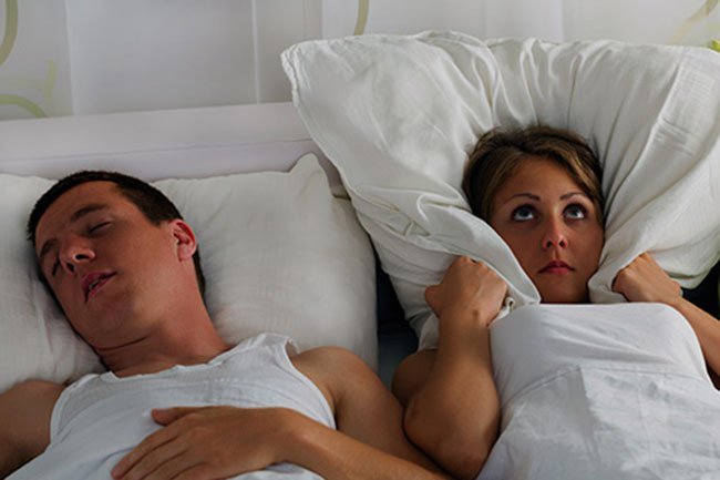 Snoring is loud enough to wake your partner.