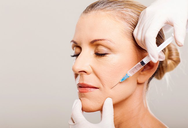 Deep wrinkles near the mouth (also known as perioral wrinkles) appear when ligaments around the mouth and chin loosen. Get rid of deep wrinkles around your mouth by eating an antioxidant-rich diet, adopting healthy lifestyle habits and using good skincare products.