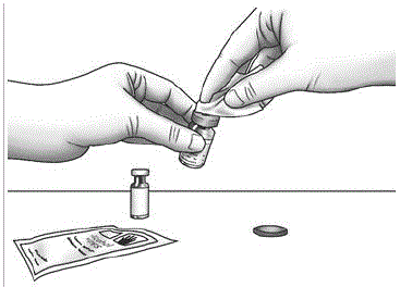 Wipe the rubber stoppers with 1
alcohol wipe - Illustration